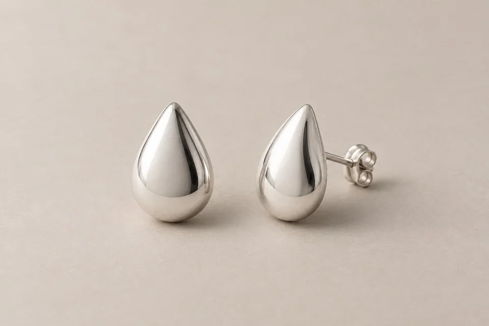 Silver-tone teardrop stud earring pair